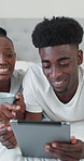 Happy, black couple or relax with tablet in home for entertainment or online subscription on bed. Man, woman or smile with technology, drink or coffee in bedroom for network, internet or app in house
