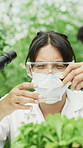 Woman, scientist and dropper with plant sample for research, experiment and study growth. Bokeh, person and microscope for agriculture science, biotechnology and testing leaves for medical innovation