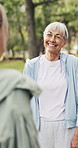 Outdoor, stretching or elderly woman for fitness, retirement workout class or personal trainer for health. Mobility activity, park or old people smile for shoulder exercise, wellness coach or warm up