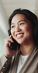 Asian, happy woman or talking with phone call for business discussion, proposal or ideas in office. Female person, consultant or friendly agent with smile on mobile smartphone for negotiation or deal