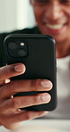 Excited, employee and hands with smartphone, office and texting with contact on social media or web. Browsing, message and person with mobile for chat, happy and notification for positive feedback