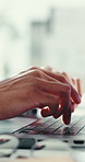 Hands, person or typing on laptop at desk for keyword research, email campaign or newsletter. Content specialist, employee or tech at agency for website copy, article draft or monitor industry trends