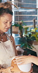 Pottery, shopping and woman with product for customer service, quality check or retail advice. People, ceramics store and owner with client for sale, smile and help with decision in small business