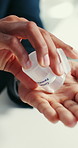 Hands, business and person with pills in office for migraine, pain relief and paracetamol dosage. Employee, container and drinking water with medicine prescription, headache tablets and remedy drugs