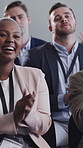 Applause, conference and laughing with business woman in auditorium for presentation or training. Development, funny and workshop with corporate employee clapping in crowd at symposium for success