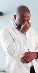 Black man, doctor and headache in grief, fatigue or mistake in hospital. Mental health, sad physician and mature medical person with healthcare anxiety for stress, loss or failed surgery at clinic