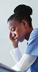 Headache, black woman and nurse with stress in hospital for medical mistake, failure or crisis with burnout. Tired, migraine and African healthcare worker with fatigue for error at bad appointment.