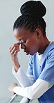 Doubt, black woman and nurse with stress in hospital for medical mistake, failure or crisis with burnout. Tired, frustrated and African healthcare worker with fatigue for error at bad appointment.