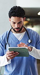 Doctor, scroll and man with tablet, hospital and medical research for illness, think and healthcare. Clinic, health professional and person with tech for treatment plan, browsing and reflection