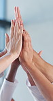 High five, hands and doctors with team in clinic for collaboration, partnership and support in meeting. Hospital, healthcare and people together for surgery, wellness or agreement for medical service