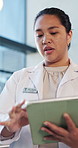 Doctor, tablet and woman in hospital, talking and digital app for surgery schedule. People, employees or physician in clinic, meeting or tech for medicine inventory, conversation or medical service