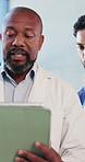 Doctor, tablet and man in clinic, advice and digital app for surgery schedule, talking or help. Mature person, healthcare or physician in hallway, meeting or tech with conversation or medical service