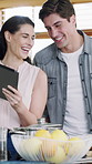 Cooking, laugh and couple in kitchen with tablet for online recipe for meal prep, lunch and dinner. Marriage, home and man with woman on tech for tutorial, instructions and culinary guide on website