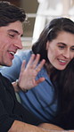 Couple, smile and wave with video call in home with contact, talk and connection with hello on web. Man, woman and happy with smartphone, mobile app and conversation with virtual chat on apartment