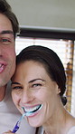 Brushing teeth, happy and face of couple in bathroom for dental hygiene, cleaning and bonding. Marriage, kiss and portrait of man and woman with toothbrush for morning routine, oral care and playful