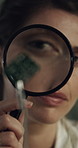 Woman, technician and magnifying glass with microchip for computer repair or electrical component. Female person, IT service or inspection with circuit board for troubleshooting hardware or fixing