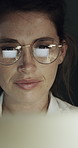Computer, glasses and business woman at night for online review, article feedback and proofreading. Creative, publishing and person with reflection for editing report, news story and research in dark