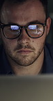 Computer, reading and business man at night for online project, finance proposal and research. Corporate, office and person with glasses on pc for financial report, budget review and planning in dark