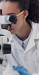 Scientist, woman and microscope in lab with marijuana leaf, biology experiment and medical research. Science, person and cannabis test in clinic with equipment, drug trial and biotech for healthcare.