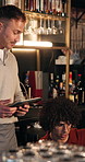 Bartender, manager and teamwork at pub with tablet, inventory checklist and inspection for small business. People, bar men and owner with app for menu, retail service feedback or hospitality review