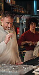 Barman, wine tasting and presentation with smell at restaurant for vintage, flavor profile and test. Person, bartender and guide with alcohol, drinks and social event at bar with customer experience