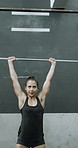 Weightlifting, fitness and woman in gym for workout, active or muscle training with strength. Athlete, equipment and female person with barbell for arm exercise, health or challenge in sports center.