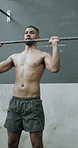 Weightlifting, fitness and man in gym for exercise, active or muscle training with strength. Athlete, equipment and male person with barbell for arm workout, health or challenge in sports center.