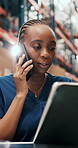 Black woman, laptop and phone call at warehouse for logistics with shipping, inventory management or report. Person, tech and communication for storage, schedule and supply chain with quality control