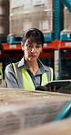 Tablet, woman and logistics worker with scanner in warehouse for checking packages for shipping. Digital technology, quality assurance and mature female supply chain employee with stock management.