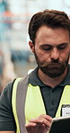 Man, reading and tablet for logistics in warehouse with inspection, supply chain and inventory. Male person, walking and digital for quality control of storage, stock check and distribution schedule