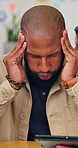 Frustrated, man and headache from chaos in office for multitasking, overwhelmed and burnout. Migraine, male person and project stress from time management, employees demand and pressure of workload