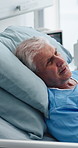 Hospital, recovery and senior man in bed with doctor for surgery results, diagnosis and consulting. Healthcare, treatment and elderly person in discussion for healing, feedback and medical service