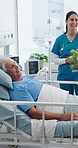 Nurse, old father and man with flowers at hospital bed for recovery support, visit or fist bump. Family, senior dad and visitor with bouquet in clinic for wellness, get well soon and surgery healing