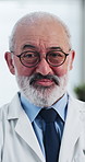 Man, doctor and face with arms crossed at clinic for healthcare service, career or pride at workplace. Mature person, medical professional and portrait for wellness, job or smile in hospital office
