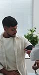 Doctor, man and check for blood pressure at clinic for assessment, wellness or monitor for hypertension. People, medical professional and patient for healthcare test, exam or consultation at hospital
