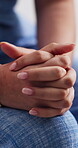 Hands, closeup and nervous for therapy session, office or consultation for trauma and mental health. Clinic, anxiety and person with depression, ptsd and woman with worry for counseling appointment