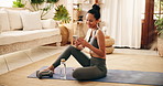 Phone, yoga and woman on floor in home for social media, exercise break and reading message. Yogi, mobile and person on mat in living room for online communication, fitness and text with smile