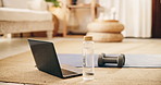 Laptop, dumbbells and water on floor of home, fitness training gear and online workout class. Exercise mat, weights or bottle with pc for live streaming in apartment, routine setup and tutorial video