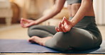 Hands, meditation and yoga with woman in living room of home for inner peace or zen exercise. Breathing, holistic wellness and mudra with calm yogi person on floor of apartment for mindfulness