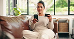 Woman, phone and credit card on sofa for ecommerce with smile, easy payment or budget in living room. Person, smartphone and digital banking for online shopping, deal or sale on fintech app at house