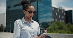 Business woman, walking and city with phone for travel, trip or outdoor commute to work. Female person, traveler or employee with sunglasses or mobile smartphone for network or app in an urban town