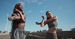 Fitness, stretching and woman friends on bridge in city for start of sports training or workout. Exercise, running and warm up with athlete people outdoor together in preparation for cardio challenge