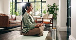 Breathe, calm and woman in home with lotus pose for balance, mindfulness and wellness on floor. Mental health, house and person on yoga mat for holistic exercise, peace and spiritual awareness