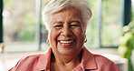 Wellness, face and senior woman in living room with laugh, positive attitude or chill in retirement. Smile, portrait or elderly person in house with good mood, happiness and peace on weekend break.