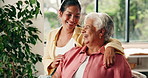 Senior mom, happy and woman in home for bonding, relationship and laughing on sofa. Family, conversation and elderly mother and daughter in living room for embrace, love and connection on weekend