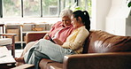 Senior mother, adult daughter or tablet on sofa with smile, browse social media and bonding together. Elderly mom, woman and happy in home with tech, online entertainment and conversation on weekend.