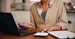 Calculator, documents and hands of woman in home for budget, finance or wealth management. Investment, laptop and paperwork with person in apartment for banking, financial planning or savings review