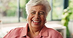 Wellness, face and old woman in house with laughing, positive attitude or chill in retirement. Smile, portrait or elderly person in home with good mood, happiness and peace on weekend break.