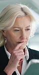 Thinking, mature woman and tablet in office for real estate, property research and auction listing. Realtor, planning and digital for expansion negotiation, resale opportunity and viewing schedule