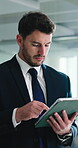 Business, man and scroll with tablet in office for stocks news, economic calendar or trading platform. Trader, person and digital app at work to view live quotes, monitor market and industry trends